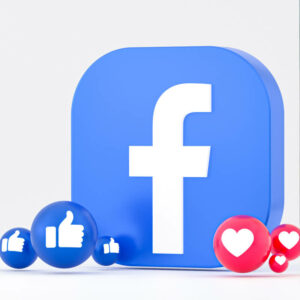 Logo Facebooka w otoczeniu łapek w górę i serduszek